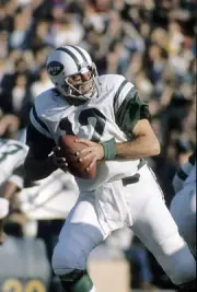 Quarterback Joe Namath New York Jets in action drops back to pass- 1974 Photo 4