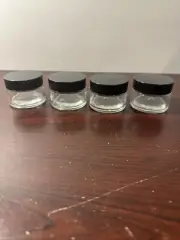 4 Pack - 1 oz Empty Glass Jars with Black Lids for Cosmetics or DIY Projects