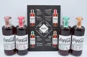 *Set of 4 European Coca Cola Signature Mixers Hutchinson bottles with info card