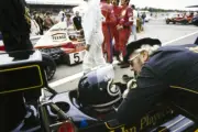 Colin Chapman talks with Jacky Ickx in the pit lane French GP 1974 Old Photo