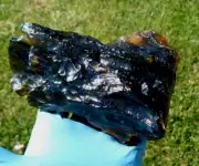 Libyan Desert Glass Meteorite Tektite impact specimen( 4500 crt)stand alone Dark