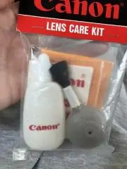 Canon Lens Care Kit Camera Care Cleaning Brush Liquid NEW In Package and Sealed