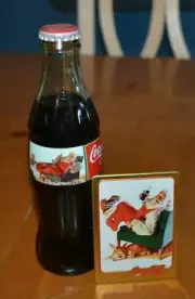 ORIGINAL COKE COCA COLA CLASSIC SANTA CLAUS BOTTLE WITH TIN CARD EASY CHAIR