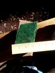 green Jade with flecks of gold throughout