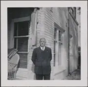Portrait of an unidentifed man outside a brick building AVIATION OLD PHOTO