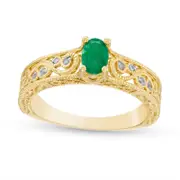 Oval Emerald and 0.05 CT. T.W. Natural Diamond Scroll Open Shank Antique Vintage-Style Ring in Solid 10K Yellow Gold