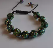 KIRKS FOLLY BEADED CORD BRACELET SPARKLING GREEN GOLD TONE