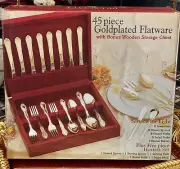 Intrnational China gold plated silverware 65 piece set in wooden box
