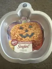Wilton Halloween Singles Jack-O-Lantern Pumpkin Mini Baking Pan Set Of 2