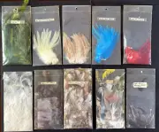 Large lot of flyfishing Tie saddles hackles red blue white feathers, nice mix