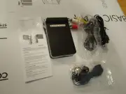 Global DV Photo Mp4 Player DV002 with Battery, Headphones, RCA & Epdm cords.