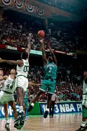 Larry Johnson Charlotte Hornets shoots v Robert Parish Boston Celt- Old Photo