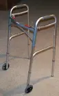 Drive Deluxe Folding Walker #10210-4ASM Two Button w/5" Wheels 350lbs Cap M4944