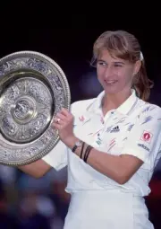 Steffi Graf of Germany poses with the trophy after defeating Monic- Old Photo 3