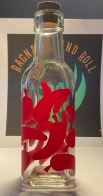 Possible pepper sauce/flakes/powder/or whatever bottle - see description