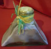 TRIANGULAR GLASS CONTAINER WITH PURPLE BATH SALTS - VINTAGE