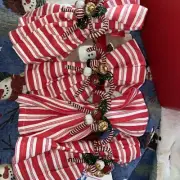 set of 4 PIER 1 red white napkins and candy cane beaded napkin rings never used