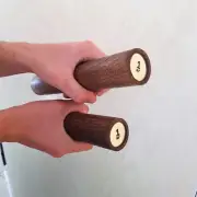 Stylish modern dumbbells made of solid oak 1 kg each with stand