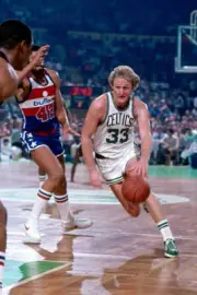 Larry Bird Boston Celtics drives to the basket during a game again- Old Photo
