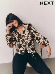 Cow Print Tie Front Long Sleeve Blouse (E52880) | $36