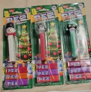 Pez Christmas Dispensers Featuring a Snowman, Snow globe and Penguin