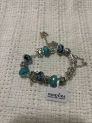 Pandora Charm Bracelet With charms included as pictured. 7.5 Inch. NWT