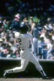 Paul Blair New York Yankees swings and watches the flight of his b- Old Photo 2