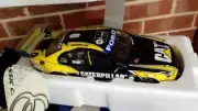 1:18 2006 Jason Bright FPR/Caterpillar Racing - signed COA