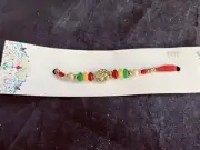 IGP Gold/Red Pearl Bead Rakhi Bracelet - Gold bead (13694)