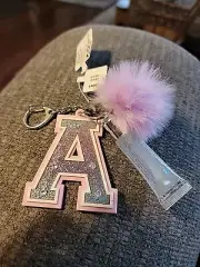 Claire’s Pink Glitter Initial Letter "A" With Clear Glitter Lipgloss Keychain