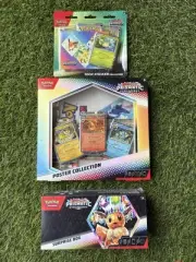 Pokémon TCG Prismatic Evolutions Surprise Box + Sticker Pack + Poster Bundle