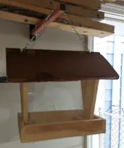 Bird Feeder made from cedar with hinged roof. 14 in tall x 14 in long x 10 in