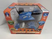 SHARPER IMAGE Blue Thunder Tumbler 360 Spins, Wheelies Toy RC Car NEW -