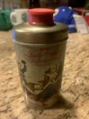 Vtg AVON * Ariane Perfumed Talc * Lady Skater Empty Tin Can * 3.75 oz *