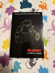 NECA Saw Ultimate Jigsaw With Black Cloak Action Figure Exclusive New In Hand!
