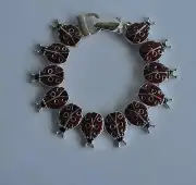 KIRKS FOLLY LADYBUG MAGNETIC BRACELET SILVER TONE