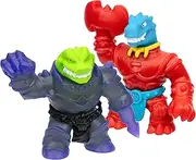 Heroes of Goo Jit Zu Smash Strikers Versus Pack: Squishy Tyro vs. Stretchy Rock Jaw. Sensory-Filled Figures with Smashing fist Weapons. Stretch Them up to 3X Their Size. Collect Them All!