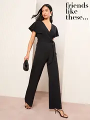 Friends Like These Black Petite Short Frill Sleeve Scuba Wrap Jumpsuit (AN3530) | $84