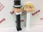 PEZ Groom with his blonde hair bride. Perfect wedding cake toppers