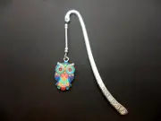 A TIBETAN SILVER BOOKMARK WITH A BLUE ENAMEL OWL CHARM. NEW.