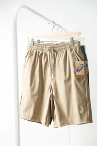 在飛比找Yahoo!奇摩拍賣優惠-ASICS 男款 卡其 灰 米白 速乾運動五分褲 428元