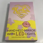 New In Box KimChi Chic Beauty Hand Held Mirror W/ Lead Lights HMWLED 01 Lavender