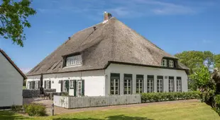 Apartment in a sunny location in a farmhouse in De Cocksdorp on the island of Texel