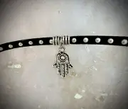 Hamsa Hand Choker Necklace On Studded Black Suede with Star Charm Down The Neck