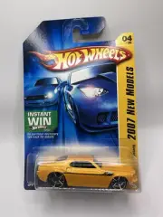 2007 HOT WHEELS NEW MODELS #4 '69 FORD MUSTANG YELLOW W/ OH5 SPOKES