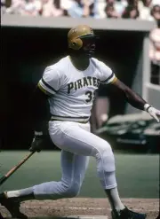 Outfielder Dave Parker Pittsburgh Pirates swings at a pitch at a - 1974 Photo