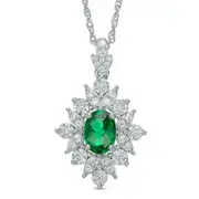 Oval Lab-Created Emerald and White Sapphire Starburst Frame Pendant in Sterling Silver