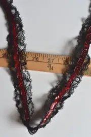 RED SEQUINS STITCHED ON BLACK LACE TRIM 5 1/2 YARDS X 1 1/4 INCHES WIDE