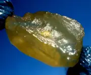 Libyan Desert Glass Meteorite Tektite impact specimen( 404 ct)Flat yellow Gem A+