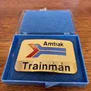 Amtrak TRAINMAN Hat Badge Plate Pin Railroad Uniform NICE!!